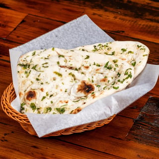 M52. Garlic Naan (2 count)